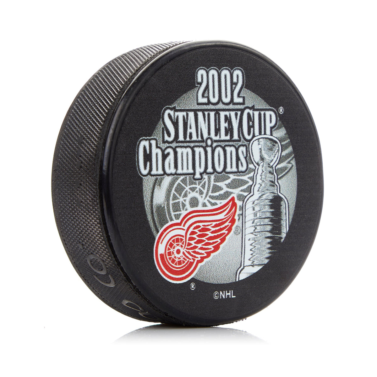 Detroit Red Wings 2002 Stanley Cup Champion Souvenir Hockey Puck product image 1, provided for visual reference and product