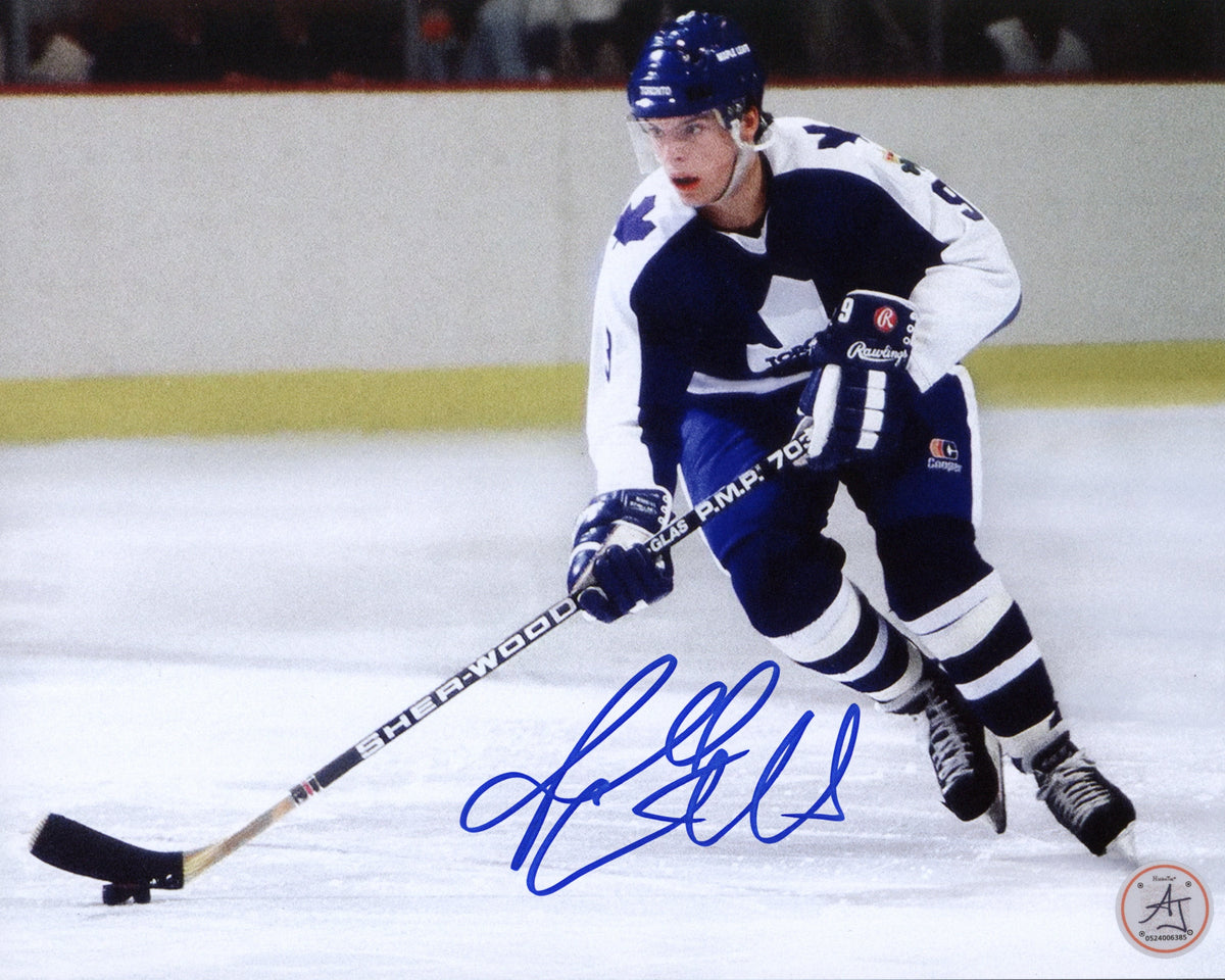 Russ Courtnall Autographed Toronto Maple Leafs Puck Rush 8x10 Photo product image 1, provided for visual reference and