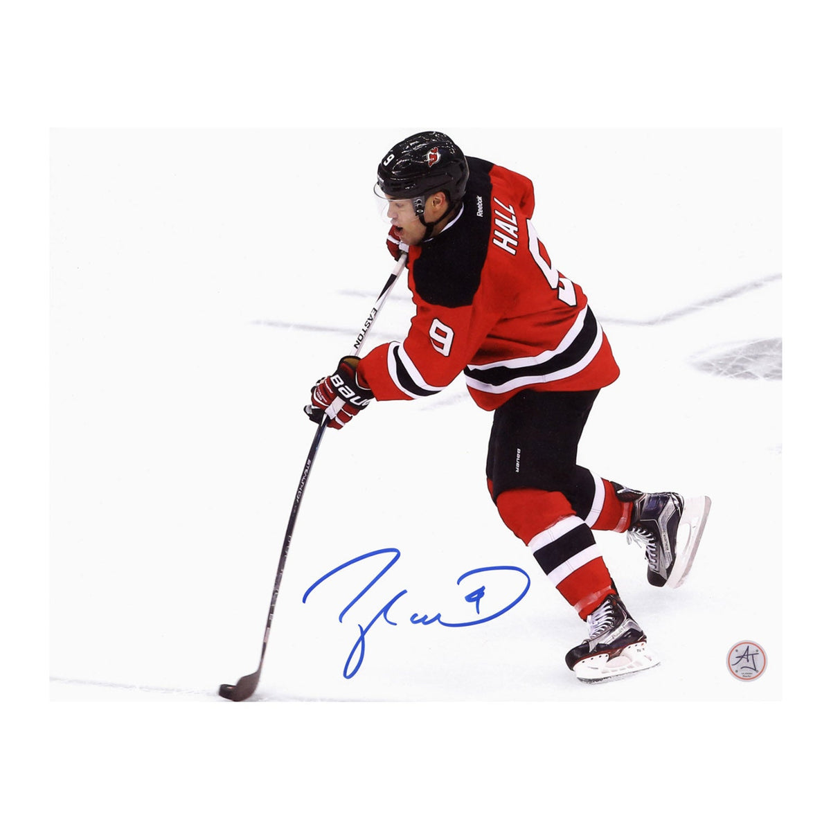 Taylor Hall Autographed New Jersey Devils Trick Shot 11x14 Photo product image 1, provided for visual reference and product