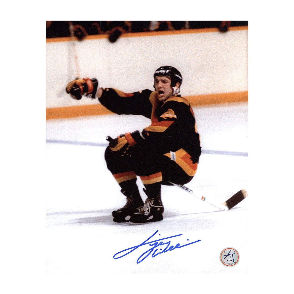 Tiger Williams Vancouver Canucks Autographed Riding The Stick 8x10 Photo product image 1, provided for visual reference and