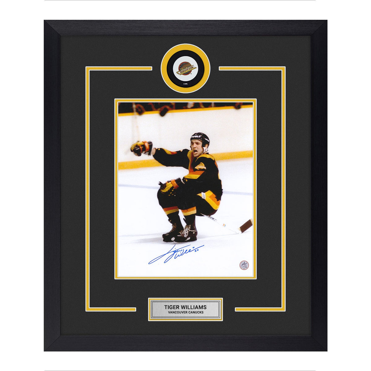 Tiger Williams Autographed Vancouver Canucks Puck Logo 23x27 Frame product image 1, provided for visual reference and