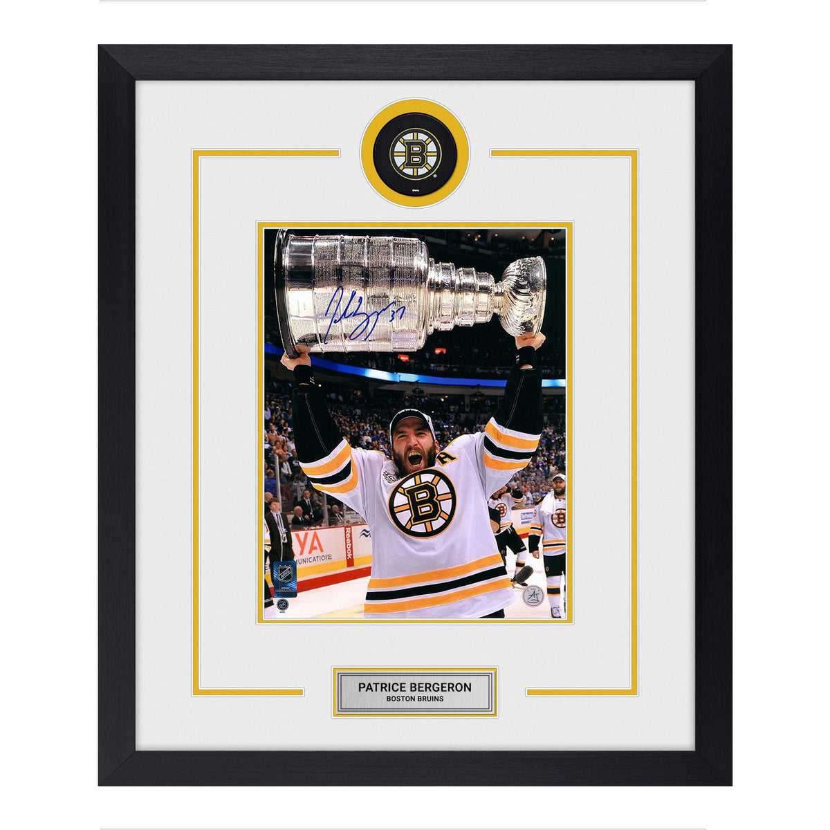 Patrice Bergeron Autographed Boston Bruins Puck Logo 22x26 Frame product image 1, provided for visual reference and product