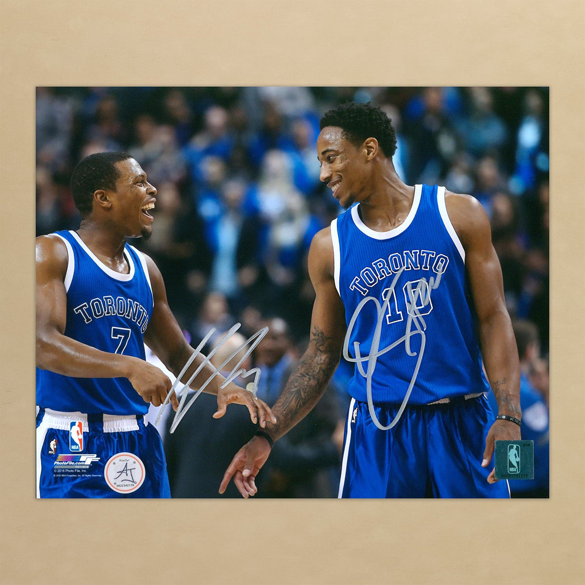 DeMar DeRozan & Kyle Lowry Dual Signed Toronto Raptors Basketball 8x10 Photo product image 1, provided for visual reference