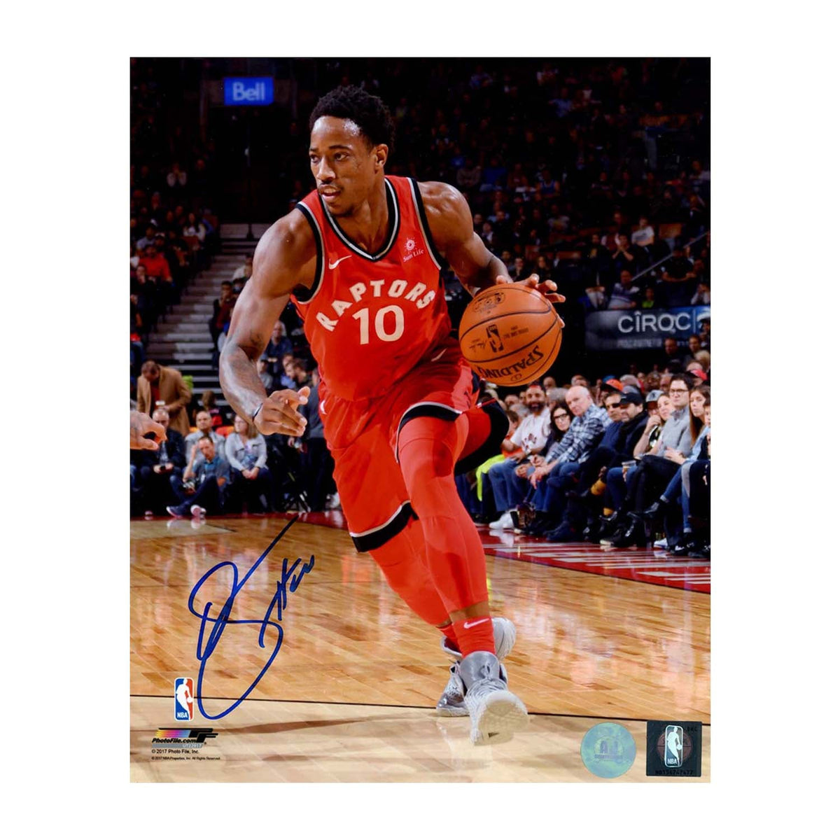 DeMar DeRozan Autographed Toronto Raptors Dribble 8x10 Photo product image 1, provided for visual reference and product