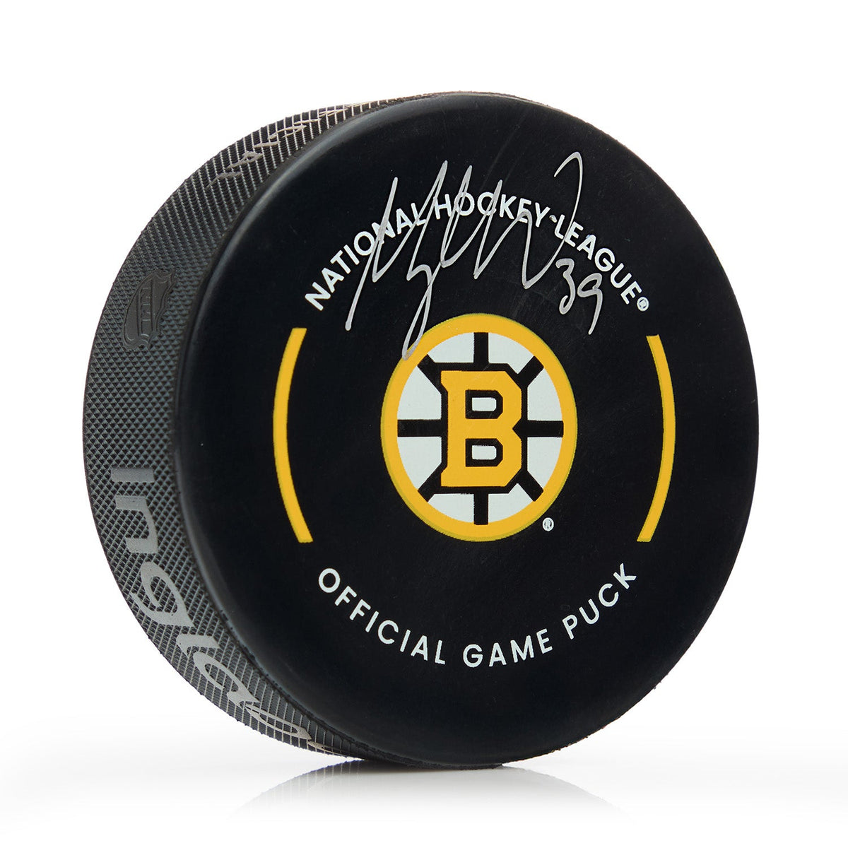 Morgan Geekie Signed Boston Bruins Official Game Puck product image 1, provided for visual reference and product detail