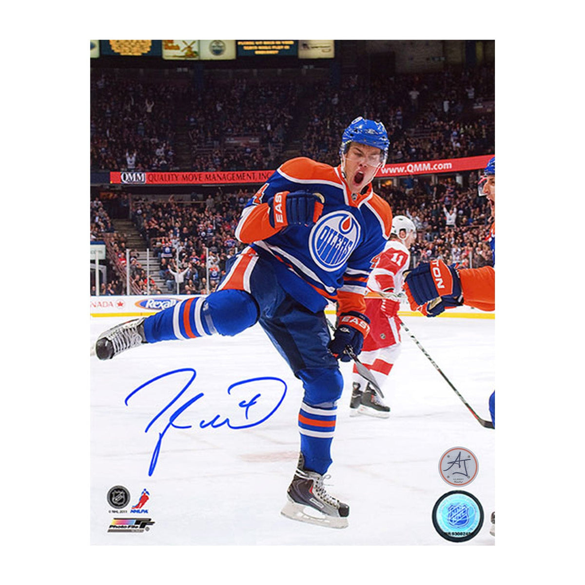Taylor Hall Edmonton Oilers Autographed Rookie Goal Celebratrion 8x10 Photo product image 1, provided for visual reference