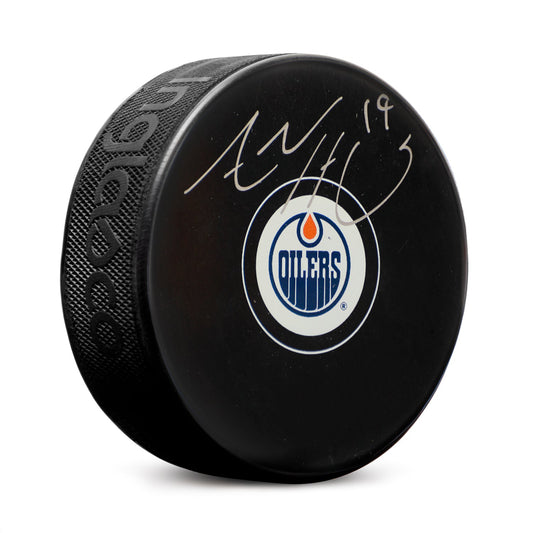 Adam Henrique Autographed Edmonton Oilers Hockey Puck product image 1, provided for visual reference and product detail