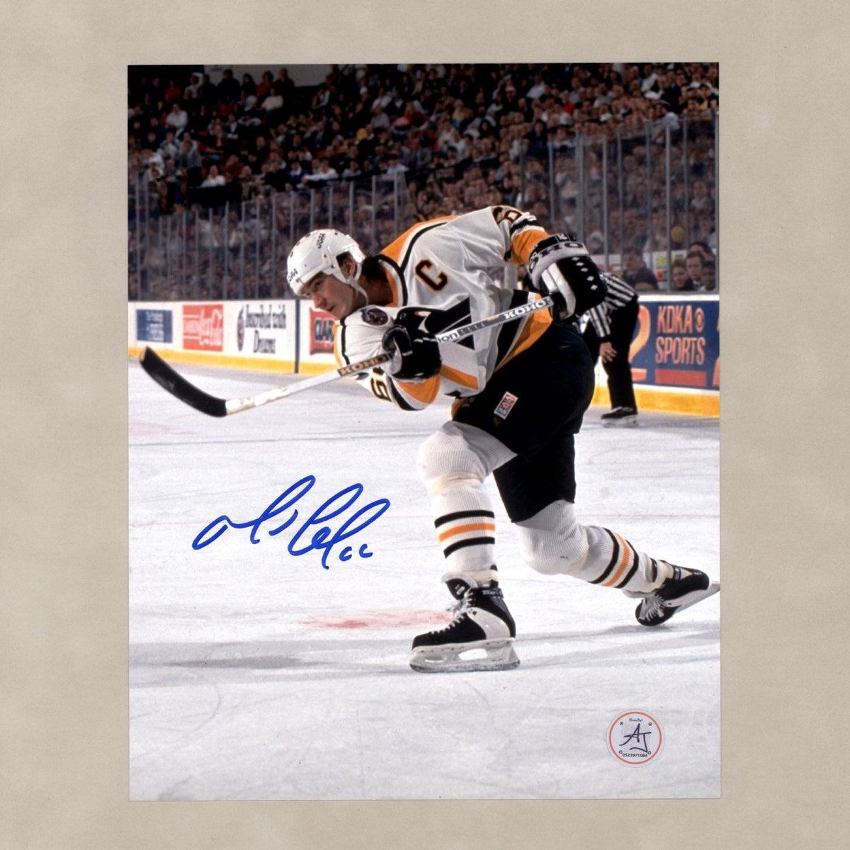 Mario Lemieux Autographed Pittsburgh Penguins Slapshot 8x10 Photo product image 1, provided for visual reference and product