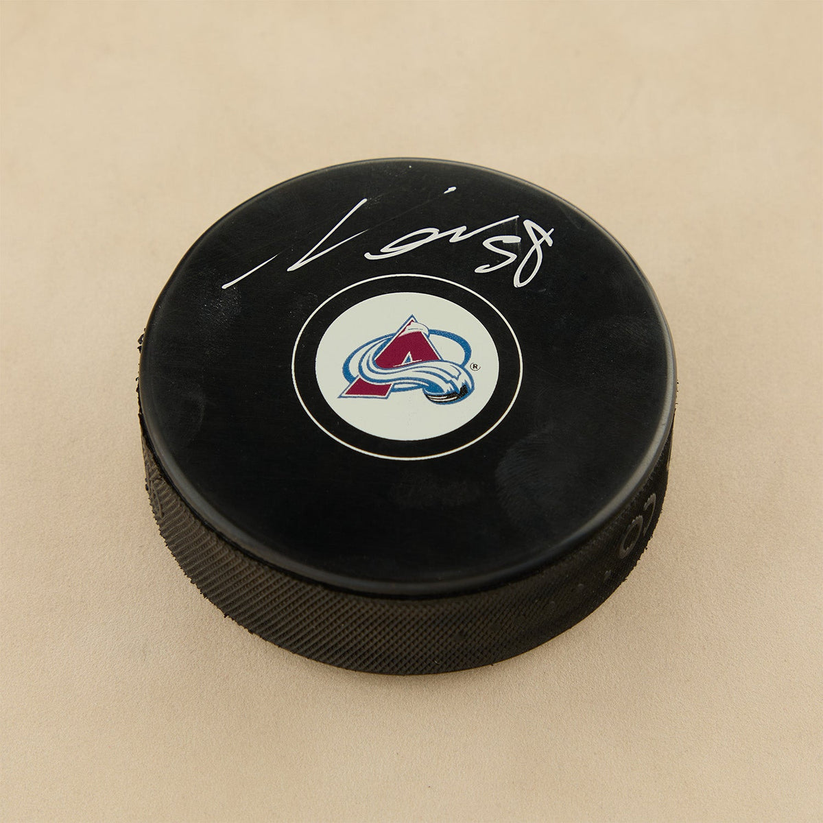Martin Necas Autographed Colorado Avalanche Hockey Puck (Flawed) product image 1, provided for visual reference and product