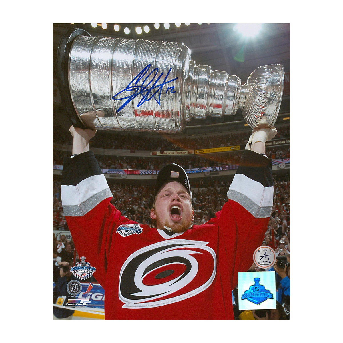 Eric Staal Autographed Carolina Hurricanes Stanley Cup 8x10 Photo product image 1, provided for visual reference and product