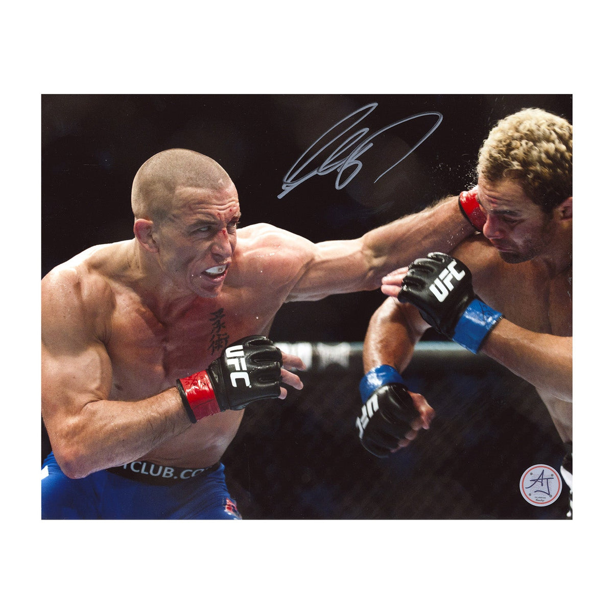 Georges St-Pierre Autographed UFC Martial Arts Punch 8x10 Photo product image 1, provided for visual reference and product